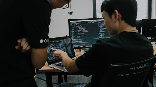 Cyber team working on a project.
