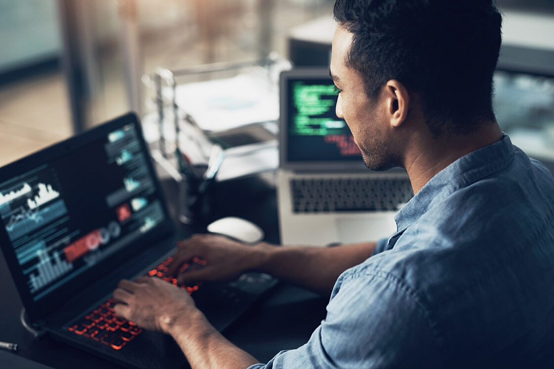 man working with SaaS security on his computer