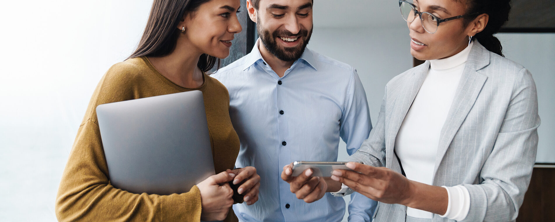 Three people in a work-related discussion.