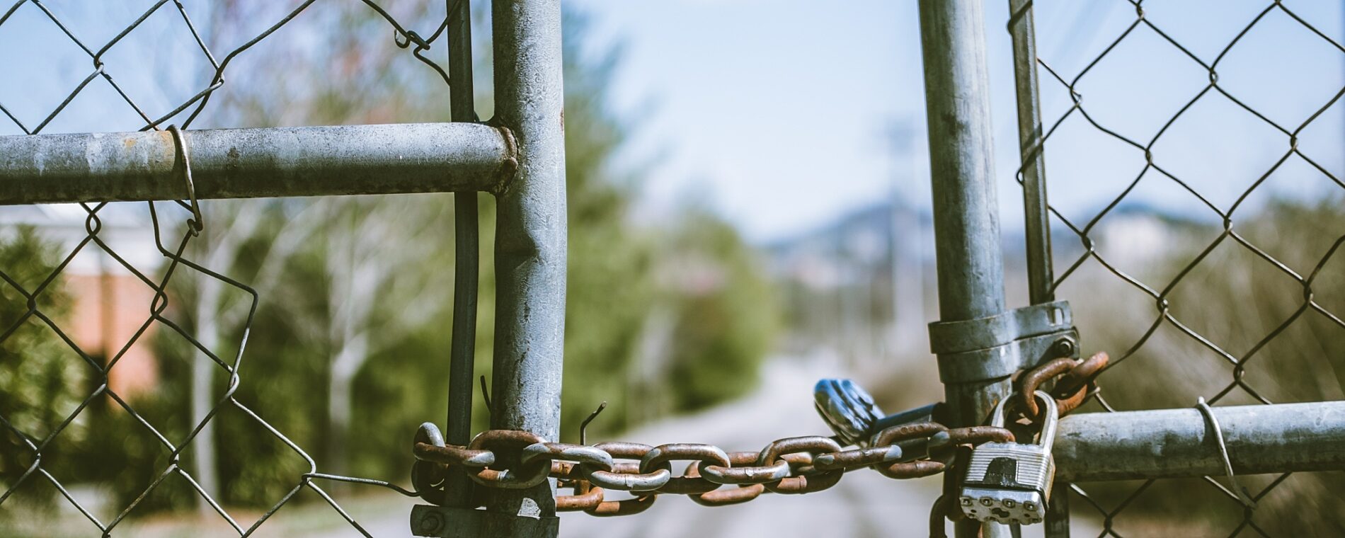 Chainlink Fence Gate, locked with a chain.