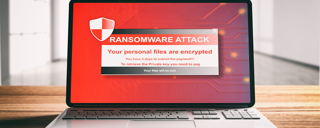 Ransomware Attack Message on a Laptop.