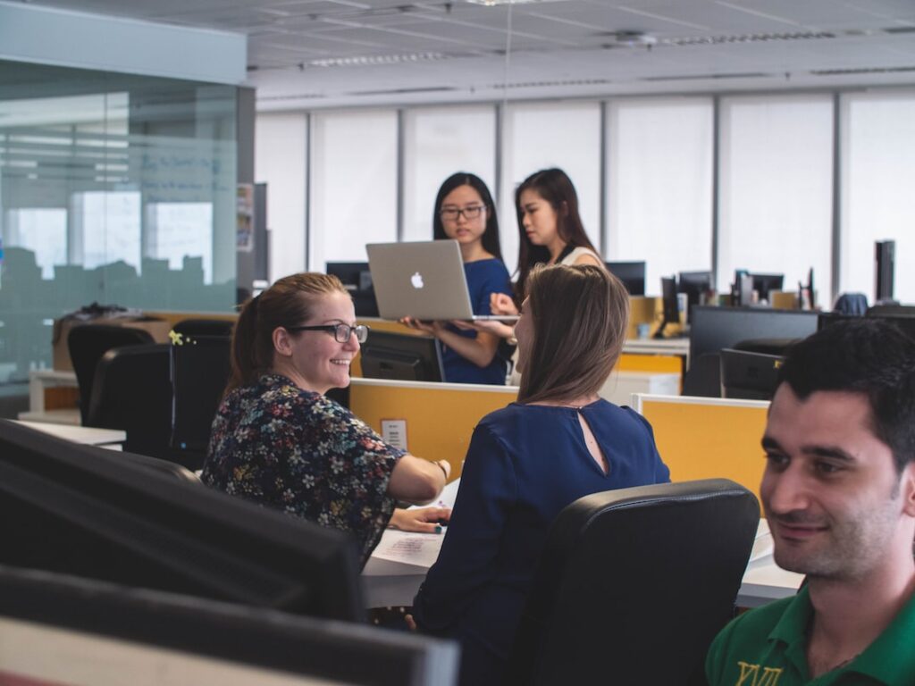 Office setting with people working with computers